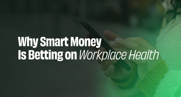 Banner with the headline “Why Smart Money Is Betting on Workplace Health” over a close-up of a person using a smartphone. The image conveys a connection between technology, employee wellbeing, and strategic investment in digital health solutions.